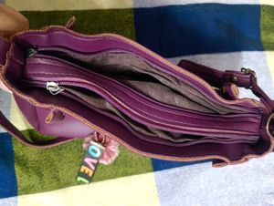 Chic Purple Handbag with Bow Accent