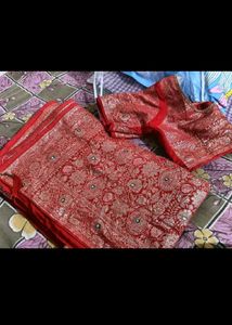 Red chiffon zari saree with stitched blouse