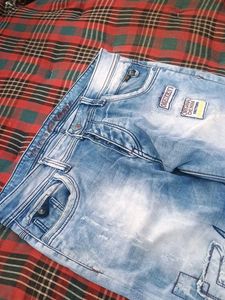 Blue Slim Fit distressed jeans