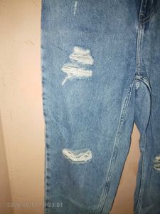 Distressed Blue Denim Jeans