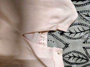 Pink Top with Cut-Out Detail