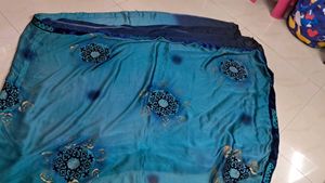 Beautiful Blue Saree with Intricate Designs