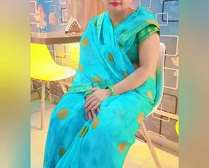 Stunning Teal Blue Saree with Gold Accents