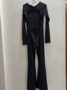 Newme Black Open Back Flare Jumpsuit
