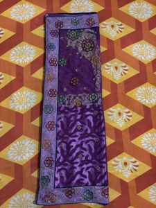 Beautiful Purple Embroidered half net Saree
