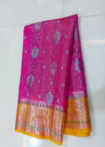 Vibrant Pink Saree with Silver Motifs