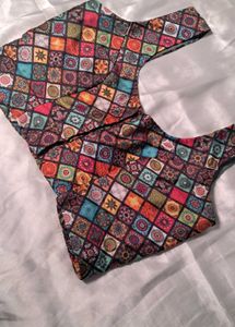 multi colour sleeveless blouse