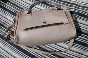 Chic Beige Handbag with Gold Accents