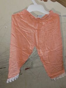 Peach Kurti with Intricate Embellishments