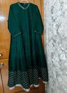 Elegant Green Gown with Embellished Border