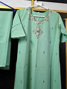Elegant Mint Green Kurta Set with Intricate Embroi