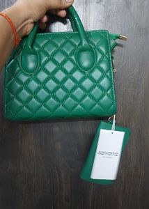 Quilted Green Handbag with a extra sling and pouch