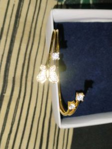 Combo of Silver Jhumka and Gold Bracelet