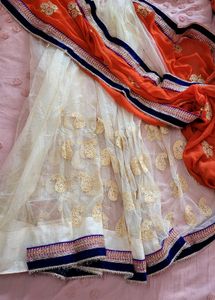 Elegant Orange n cream net  Saree