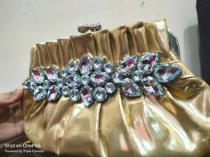 Golden Clutch With Big Diamonds