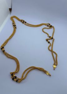 Elegant Gold Chain with Black Beads