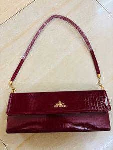 Chic Burgundy Clutch Bag 👛