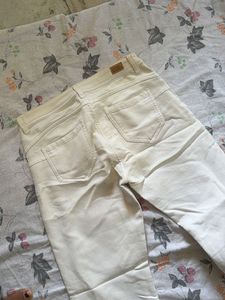 Cream Bell Bottom Jeans