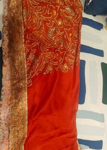 Stunning Orange Embellished Saree