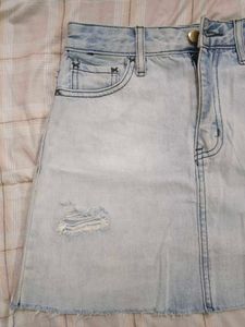 Light Wash Ripped Denim Mini Skirt