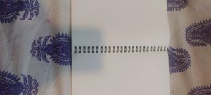 spiral note book with white clear pages