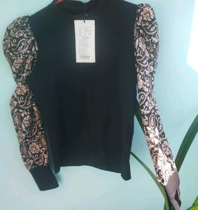 Elegant Black Top with Puff Sleeves