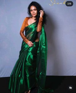 Elegant Emerald Green raga tissue Saree