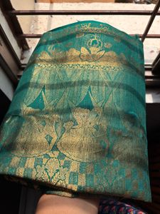 Beautiful Teal Saree with Gold Border