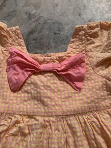 Cute Peach Dress with Pink Bow