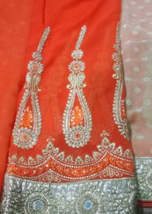 Stunning Orange Embroidered Saree