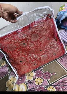 Red Banarasi chiffon saree with stitched blouse