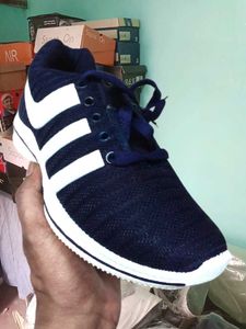 NEW ONE USED SPORTS SHOES FOR MEN.
