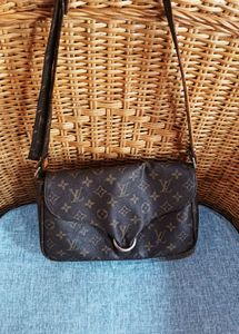 LV sling bag in mint condition, without code.