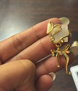 Mystique Butterfly Bow Drop Earrings