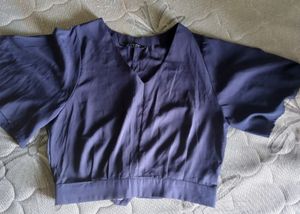 Blue Top With Flared Sleeves..