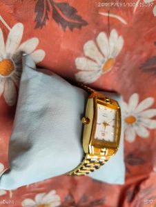 Elegant Gold Tone Square Watch