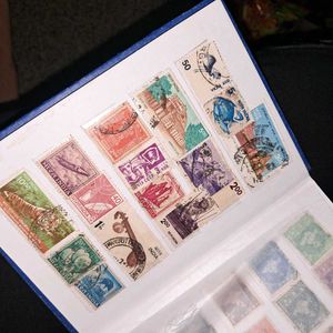 Vintage Stamp Album with 200+ stamps