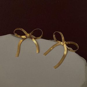 Elegant Gold Bow Earrings