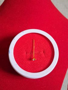 Gold Flower Nose Pin as earpressing