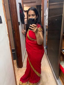 Elegant Red Saree with Golden Border