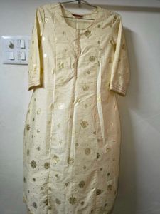 Elegant Cream Kurta with Gold Print