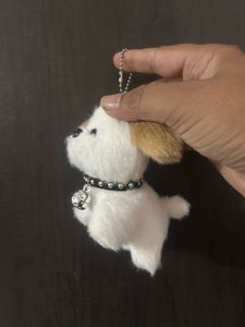 fluffy white puppy plush keychain featuring