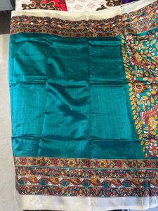Elegant Teal Saree with Intricate Embroidery