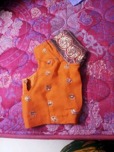 Elegant Orange Embroidered Saree
