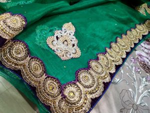 Elegant Green Saree with Gold Embroidery
