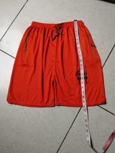 Orange Athletic Shorts with Zippers