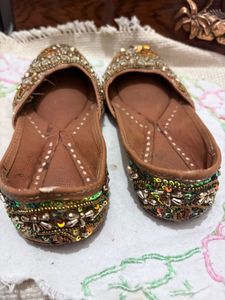 Embellished golden traditional Juttis