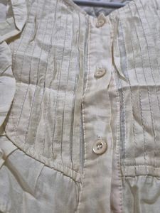 Ruffled Button-Down Top