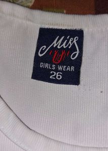 White Sleeveless Top