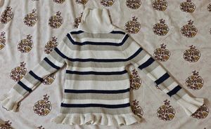 Striped Turtleneck Sweater with Ruffle Trim